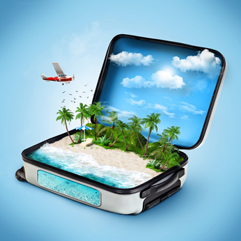 Open suitcase with a tropical island inside. Traveling